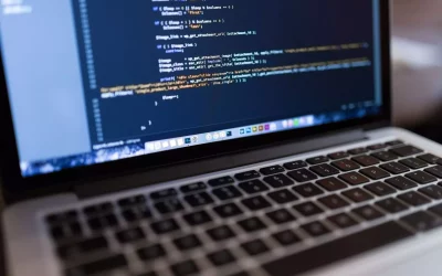 Focused view of programming code displayed on a laptop, ideal for tech and coding themes.